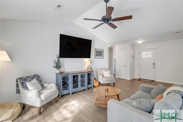 17 S Lake Dr, Savannah, GA 31410 - living area featuring wood finished floors, lofted ceiling, and a ceiling fan