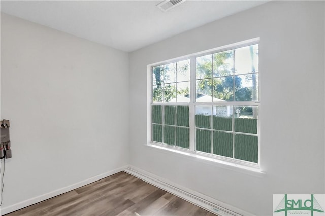 17 S Lake Dr, Savannah, GA 31410 - unfurnished room with wood finished floors and baseboards
