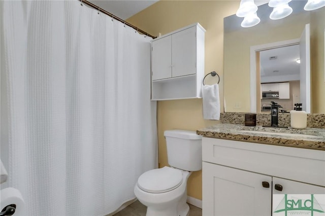 17 S Lake Dr, Savannah, GA 31410 - bathroom with vanity, toilet, curtained shower, and a chandelier