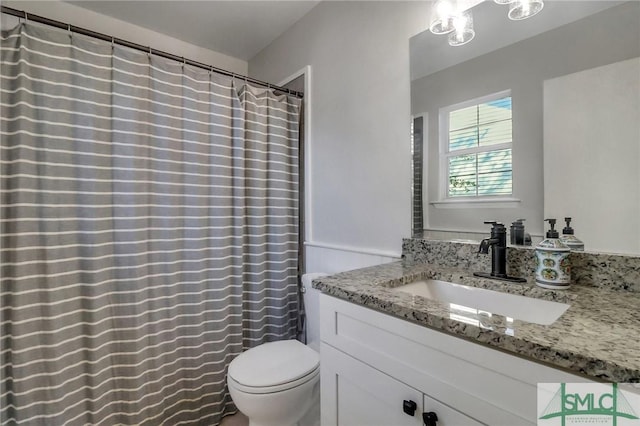 17 S Lake Dr, Savannah, GA 31410 - full bathroom featuring vanity and toilet