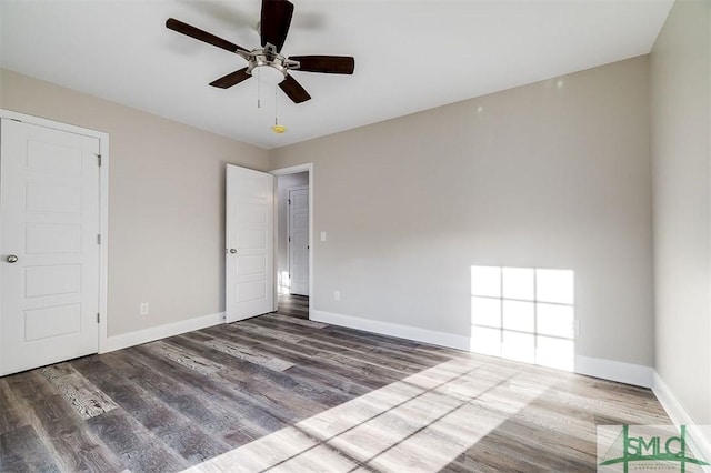 unfurnished bedroom with hardwood / wood-style floors and ceiling fan