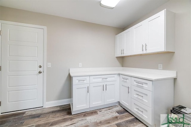 laundry room featuring light hardwood / wood-style floors