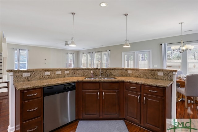 kitchen featuring dishwasher, dark hardwood / wood-style floors, and sink