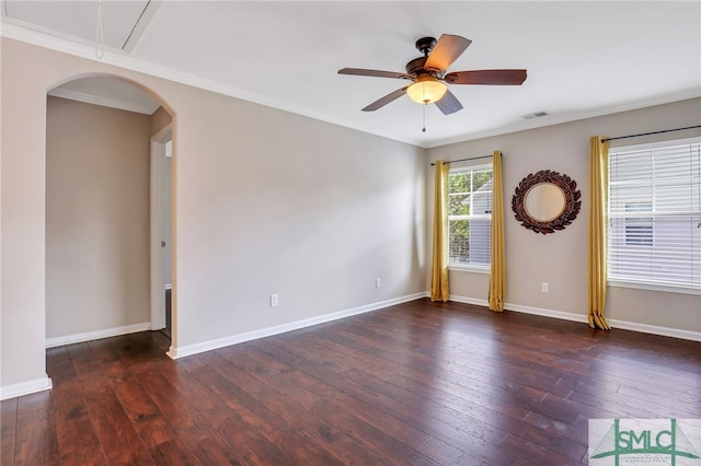 unfurnished room with crown molding, dark hardwood / wood-style flooring, and ceiling fan