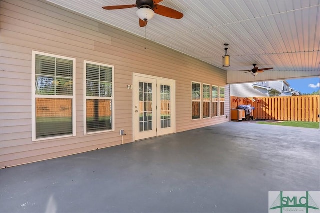 view of patio featuring ceiling fan