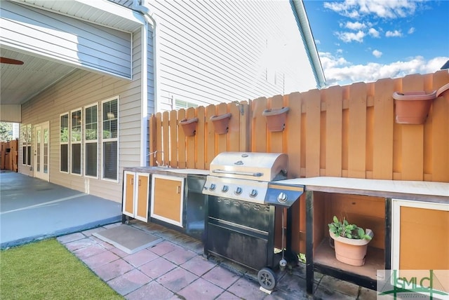 view of patio / terrace featuring a grill