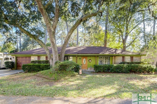 ranch-style home with a garage