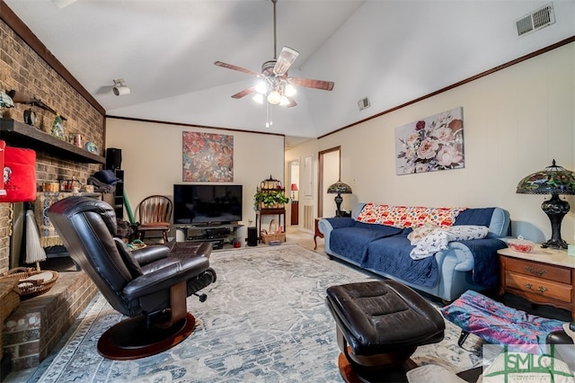 living room with ceiling fan, lofted ceiling, and ornamental molding