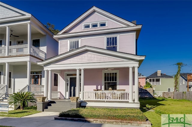 neoclassical / greek revival house with covered porch