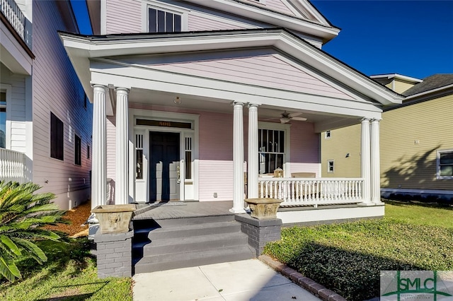 property entrance with ceiling fan and covered porch