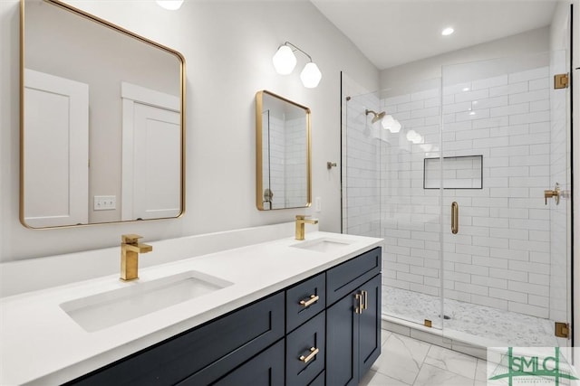 bathroom with vanity and an enclosed shower