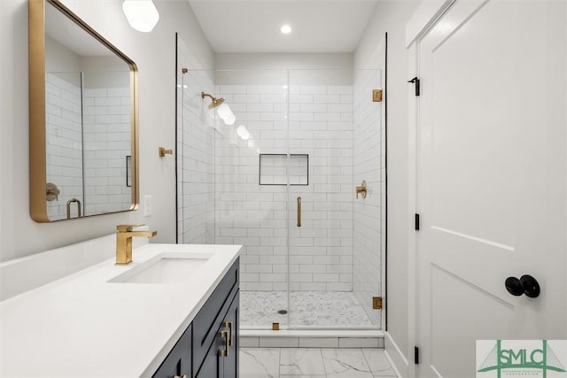 bathroom featuring vanity and walk in shower