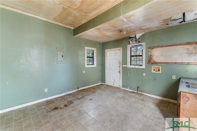 interior space featuring wood ceiling and electric panel