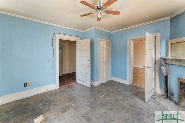 unfurnished bedroom featuring ceiling fan and crown molding