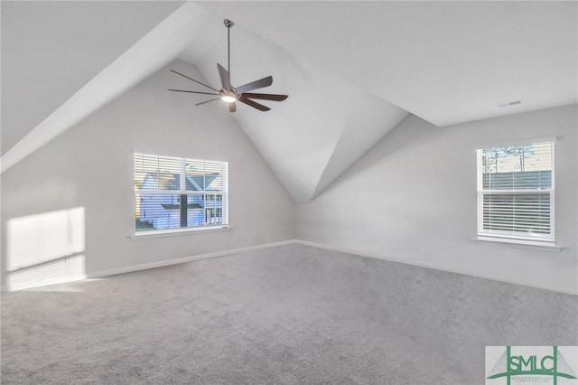 bonus room featuring plenty of natural light, carpet, lofted ceiling, and ceiling fan