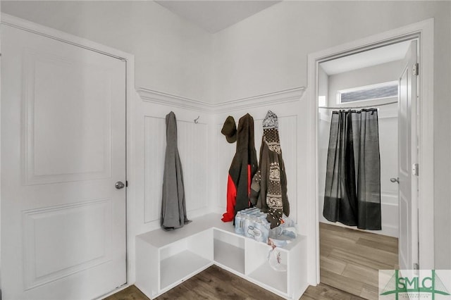 mudroom with wood finished floors