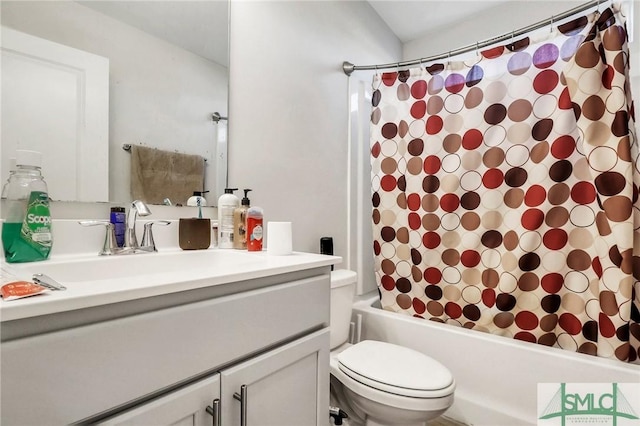 full bathroom featuring vanity, toilet, and shower / bath combo with shower curtain