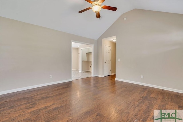 empty room featuring light hardwood / wood-style floors, ceiling fan, and lofted ceiling