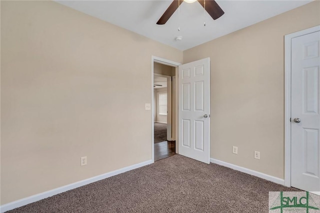 unfurnished bedroom with carpet flooring and ceiling fan