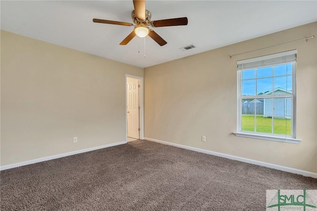 carpeted empty room with ceiling fan