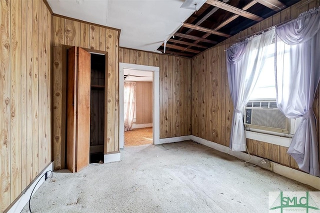 interior space featuring wooden walls