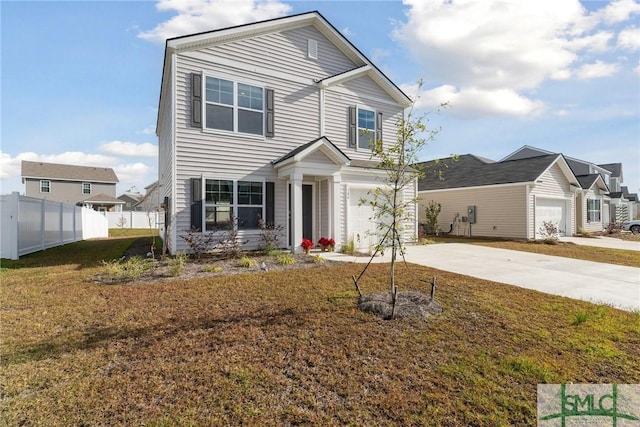 front of property featuring a garage and a front lawn