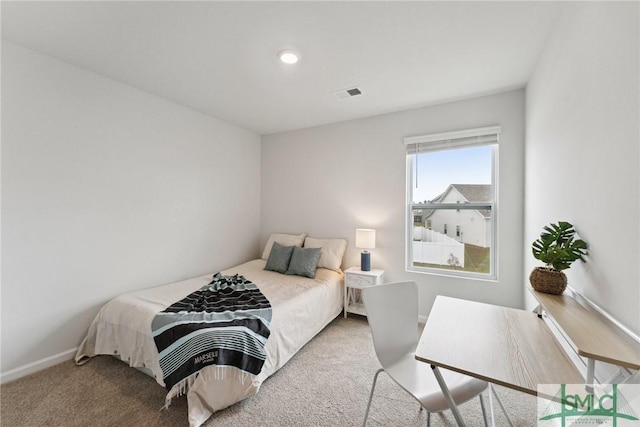 bedroom featuring carpet