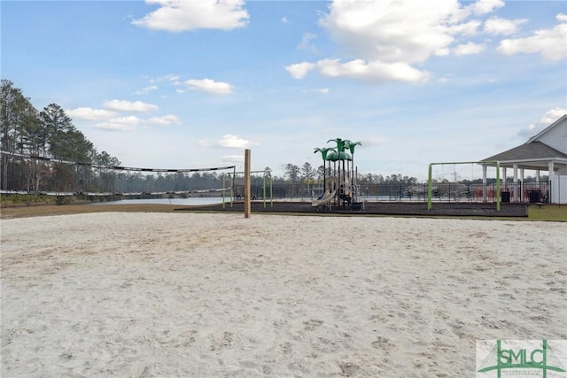 surrounding community featuring volleyball court and a playground