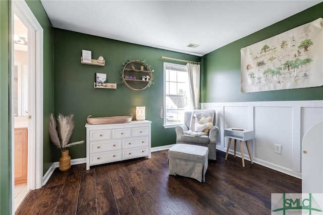 living area with dark hardwood / wood-style floors