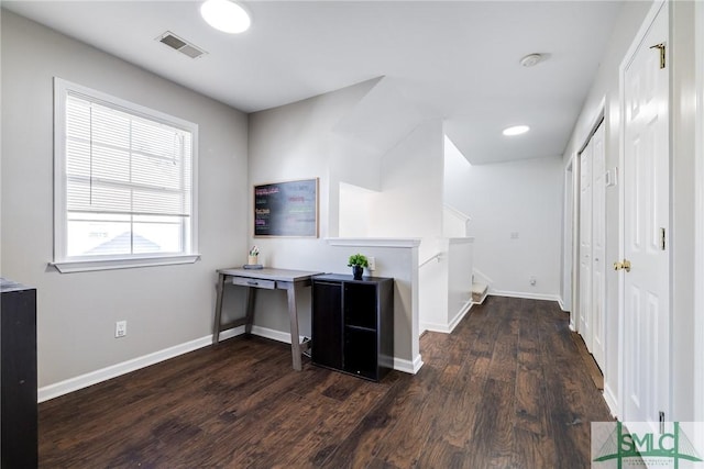 hallway featuring dark hardwood / wood-style floors