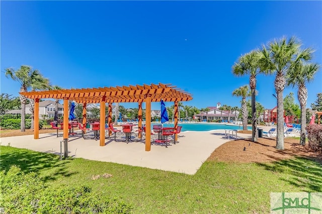 surrounding community with a pergola, a patio area, a lawn, and a pool