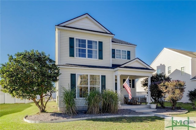 view of front of home featuring a front lawn