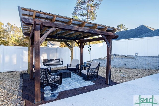 view of patio / terrace with a pergola and an outdoor living space