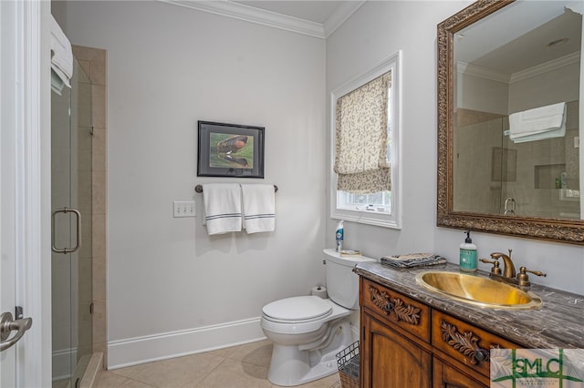 bathroom featuring tile patterned floors, an enclosed shower, vanity, crown molding, and toilet