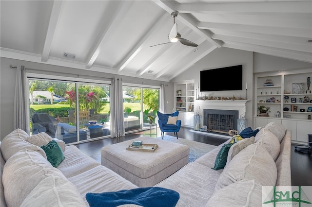 living room with hardwood / wood-style floors, lofted ceiling with beams, and ceiling fan