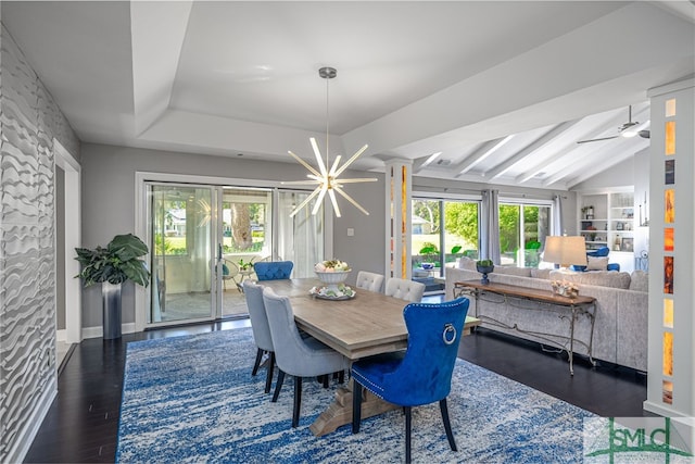 dining area with vaulted ceiling with beams, dark wood-type flooring, and ceiling fan with notable chandelier