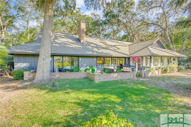 back of property featuring an outdoor living space, a yard, and a patio area