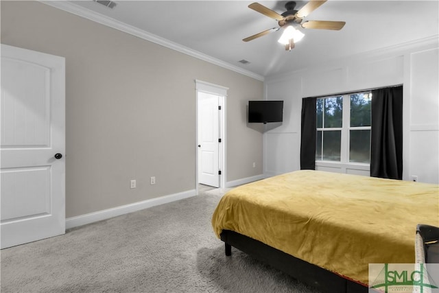 bedroom with ceiling fan, light colored carpet, and ornamental molding