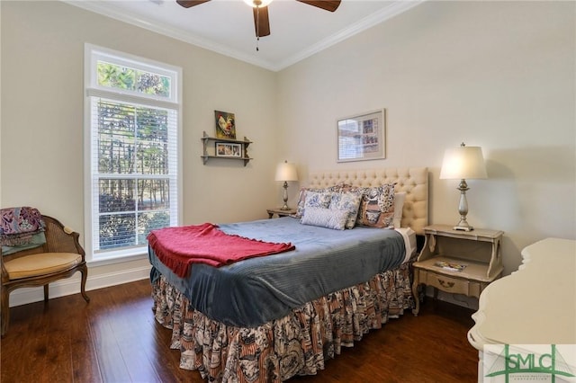 bedroom featuring ceiling fan, dark hardwood / wood-style flooring, and ornamental molding