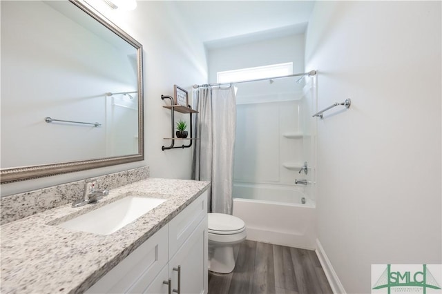 full bathroom with vanity, toilet, wood-type flooring, and shower / tub combo with curtain