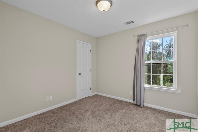 view of carpeted spare room