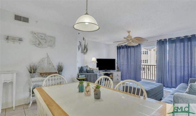 3 3rd St Unit 517, Tybee Island, GA 31328 - dining space with light tile patterned floors and a ceiling fan
