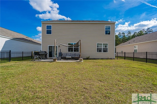 rear view of house with an outdoor living space, a patio, and a lawn