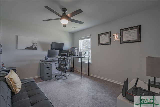 office space featuring carpet flooring and ceiling fan