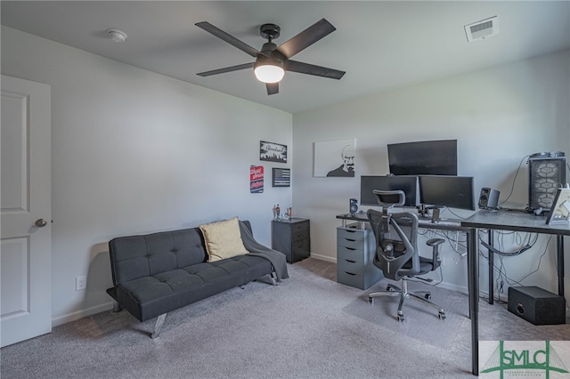 office area with carpet floors and ceiling fan