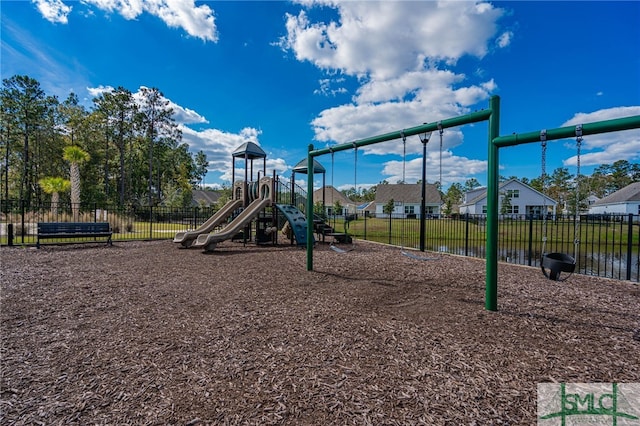 view of jungle gym with a water view