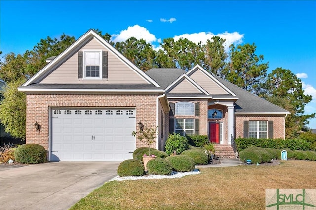 view of front of home featuring a garage and a front yard