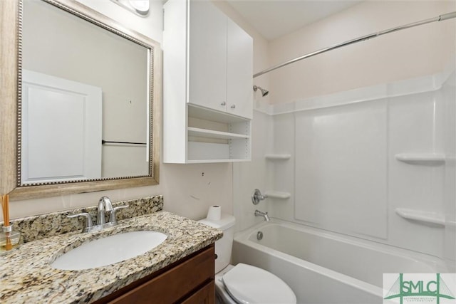 full bathroom with toilet, shower / bathing tub combination, and vanity