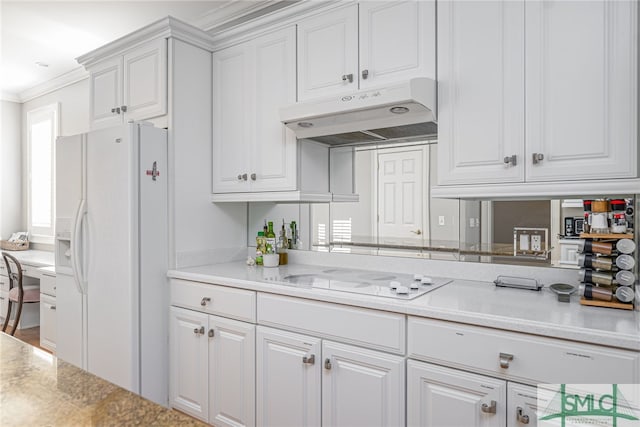 kitchen with white cabinets, white appliances, and ornamental molding