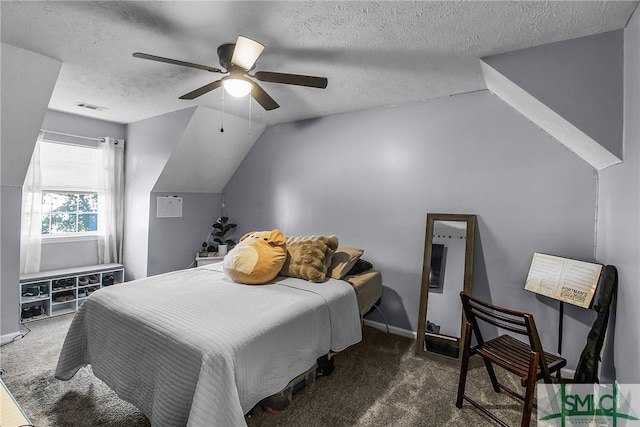 bedroom featuring visible vents, vaulted ceiling, a textured ceiling, and carpet flooring